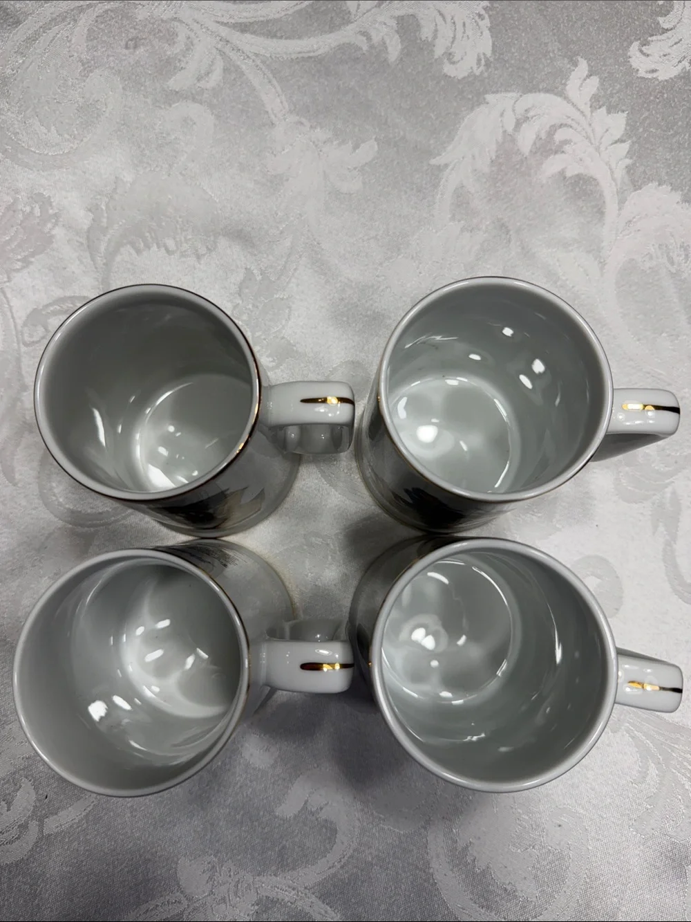 (4) Vtg. Norman Rockwell museum tankards/mugs featuring classic artwork.  12oz.